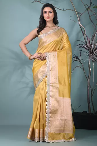 yellow tissue saree with gotapatti detailing and elegant border
