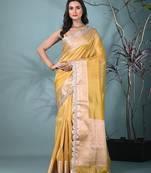 yellow tissue saree with gotapatti detailing and elegant border