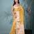 yellow tissue saree with gotapatti detailing and elegant border