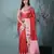 red tissue saree with gotapatti detailing and elegant border
