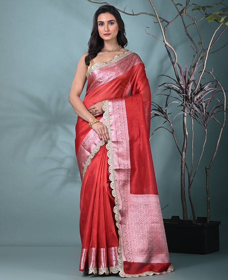 red tissue saree with gotapatti detailing and elegant border