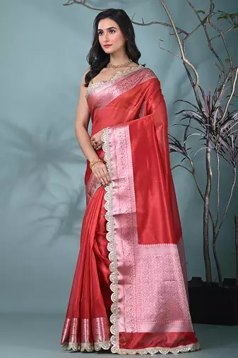 red tissue saree with gotapatti detailing and elegant border