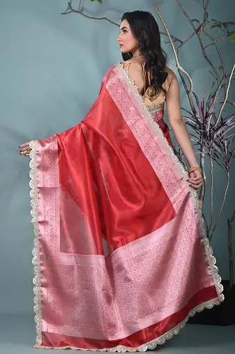 red tissue saree with gotapatti detailing and elegant border