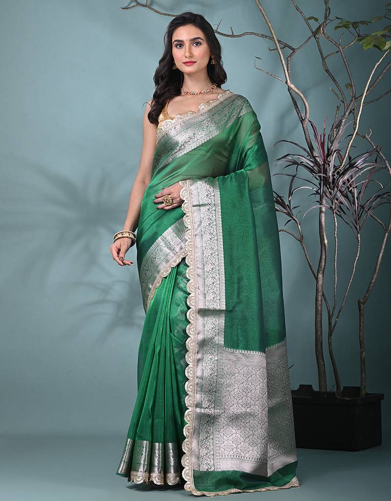 green tissue saree with gotapatti detailing and elegant border