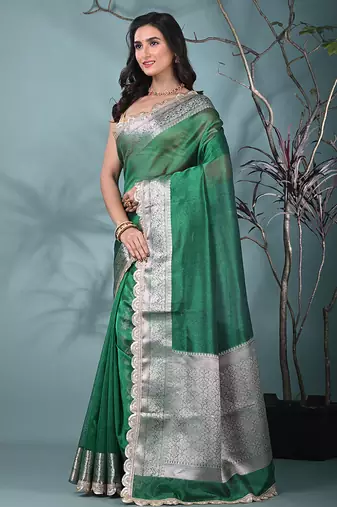 green tissue saree with gotapatti detailing and elegant border