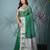 green tissue saree with gotapatti detailing and elegant border
