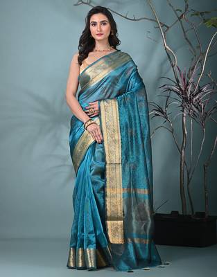 sapphire blue tissue saree with stone detailing 1