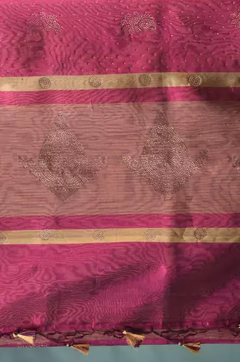 magenta tissue saree with stone detailing