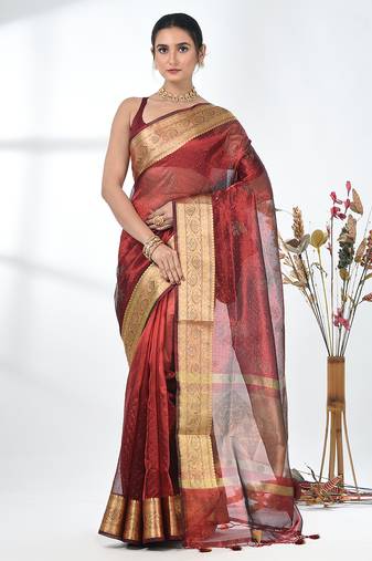 dark red tissue saree with stone detailing