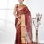 dark red tissue saree with stone detailing