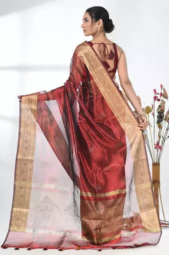 dark red tissue saree with stone detailing