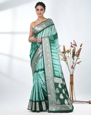 green & white silk blend tie & dye saree with intricate border 1