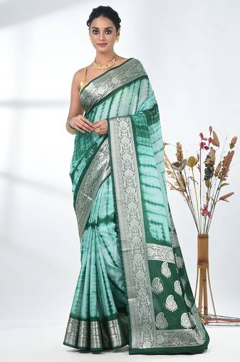green & white silk blend tie & dye saree with intricate border