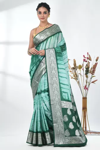 green & white silk blend tie & dye saree with intricate border