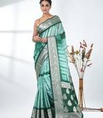 green & white silk blend tie & dye saree with intricate border