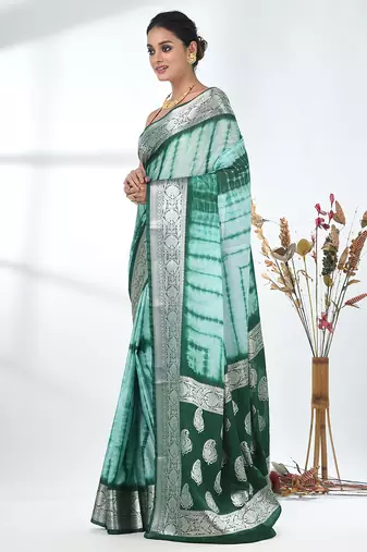 green & white silk blend tie & dye saree with intricate border