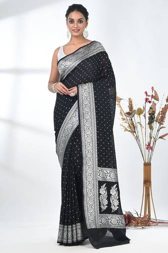 black georgette saree with silver border and detailing