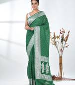 green georgette saree with silver border and detailing
