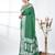 green georgette saree with silver border and detailing