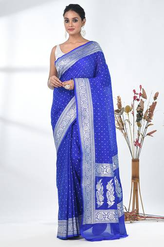 blue georgette saree with silver border and detailing
