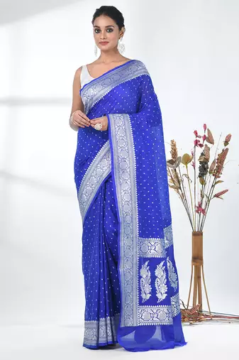 blue georgette saree with silver border and detailing