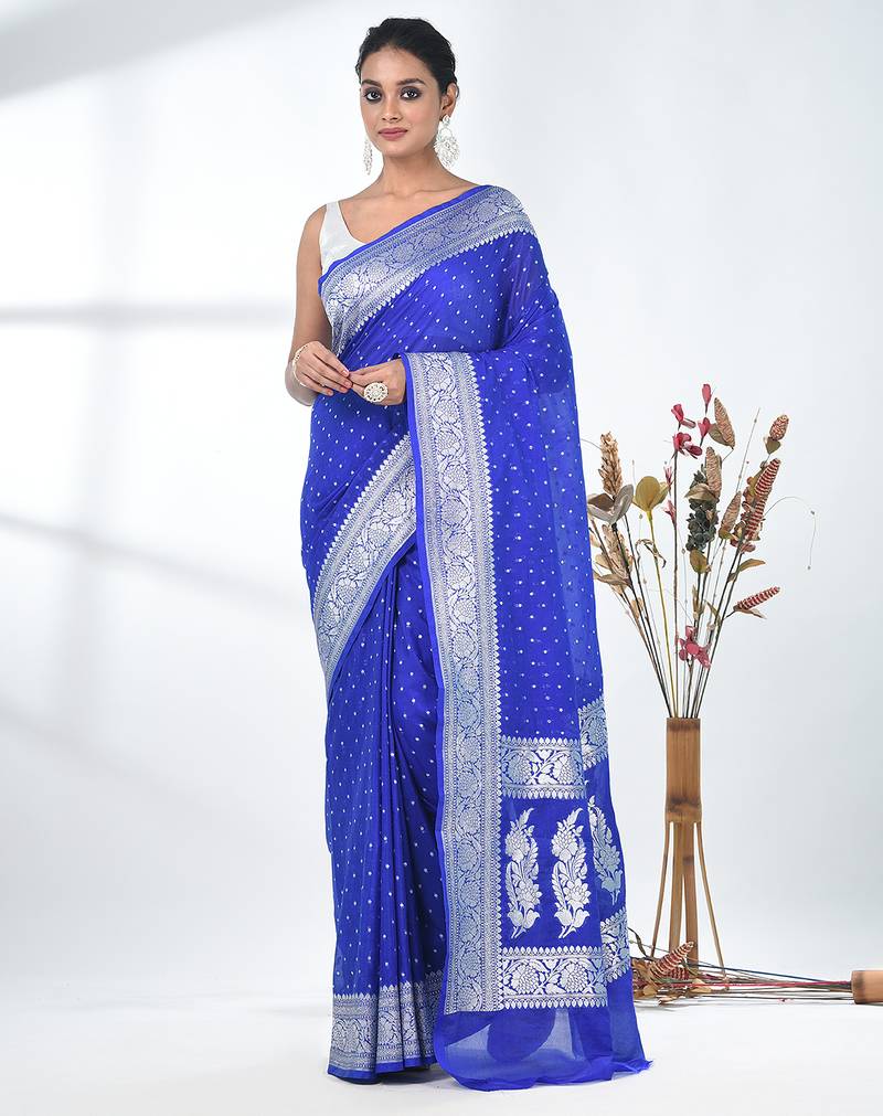 blue georgette saree with silver border and detailing