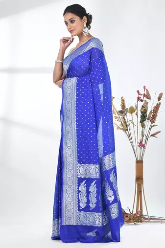 blue georgette saree with silver border and detailing