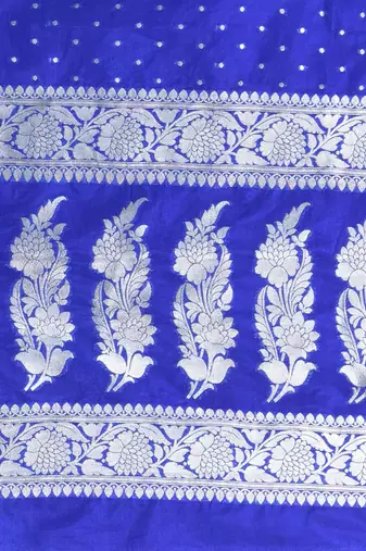 blue georgette saree with silver border and detailing