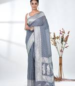 grey georgette saree with silver border and detailing