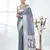 grey georgette saree with silver border and detailing