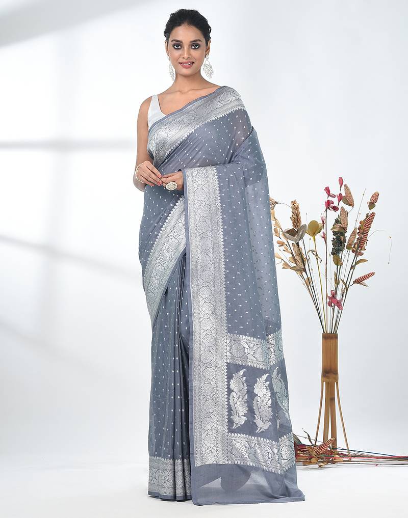 grey georgette saree with silver border and detailing