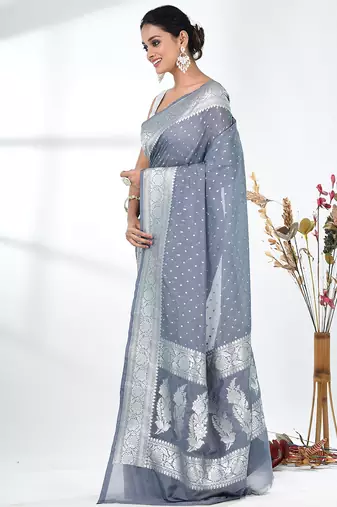 grey georgette saree with silver border and detailing