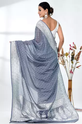 grey georgette saree with silver border and detailing