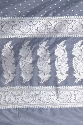 grey georgette saree with silver border and detailing