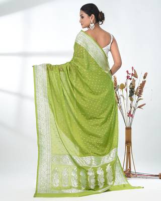 green georgette saree with silver border and detailing 3