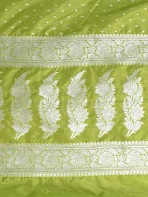 green georgette saree with silver border and detailing 4