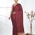 maroon modal silk blend saree with golden border and tassels