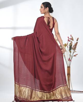 maroon modal silk blend saree with golden border and tassels 3