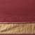 maroon modal silk blend saree with golden border and tassels