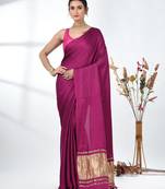 magenta modal silk blend saree with golden border and tassels