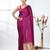 magenta modal silk blend saree with golden border and tassels