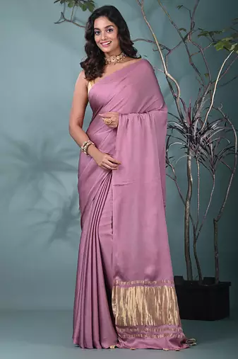 mauve modal silk blend saree with golden border and tassels