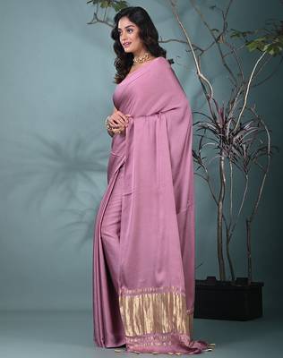 mauve modal silk blend saree with golden border and tassels 2