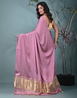 mauve modal silk blend saree with golden border and tassels 3