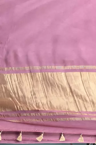 mauve modal silk blend saree with golden border and tassels