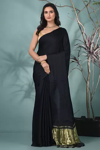 black modal silk blend saree with golden border and tassels