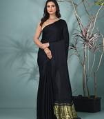 black modal silk blend saree with golden border and tassels