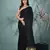 black modal silk blend saree with golden border and tassels