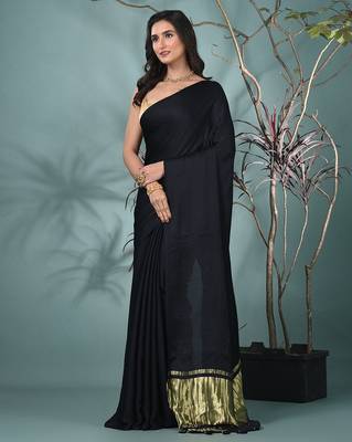 black modal silk blend saree with golden border and tassels 2