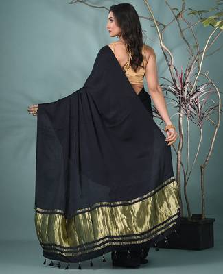 black modal silk blend saree with golden border and tassels 3